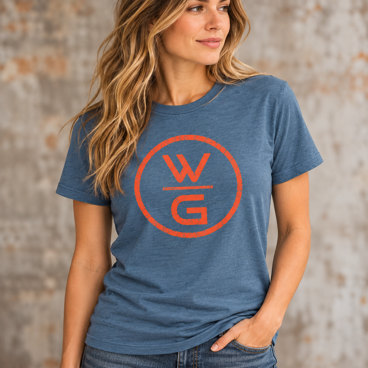 Woman wearing blue Wrong George WG logo T-shirt